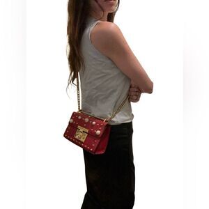 Gucci Red Crossbody Bag with Gold Accents